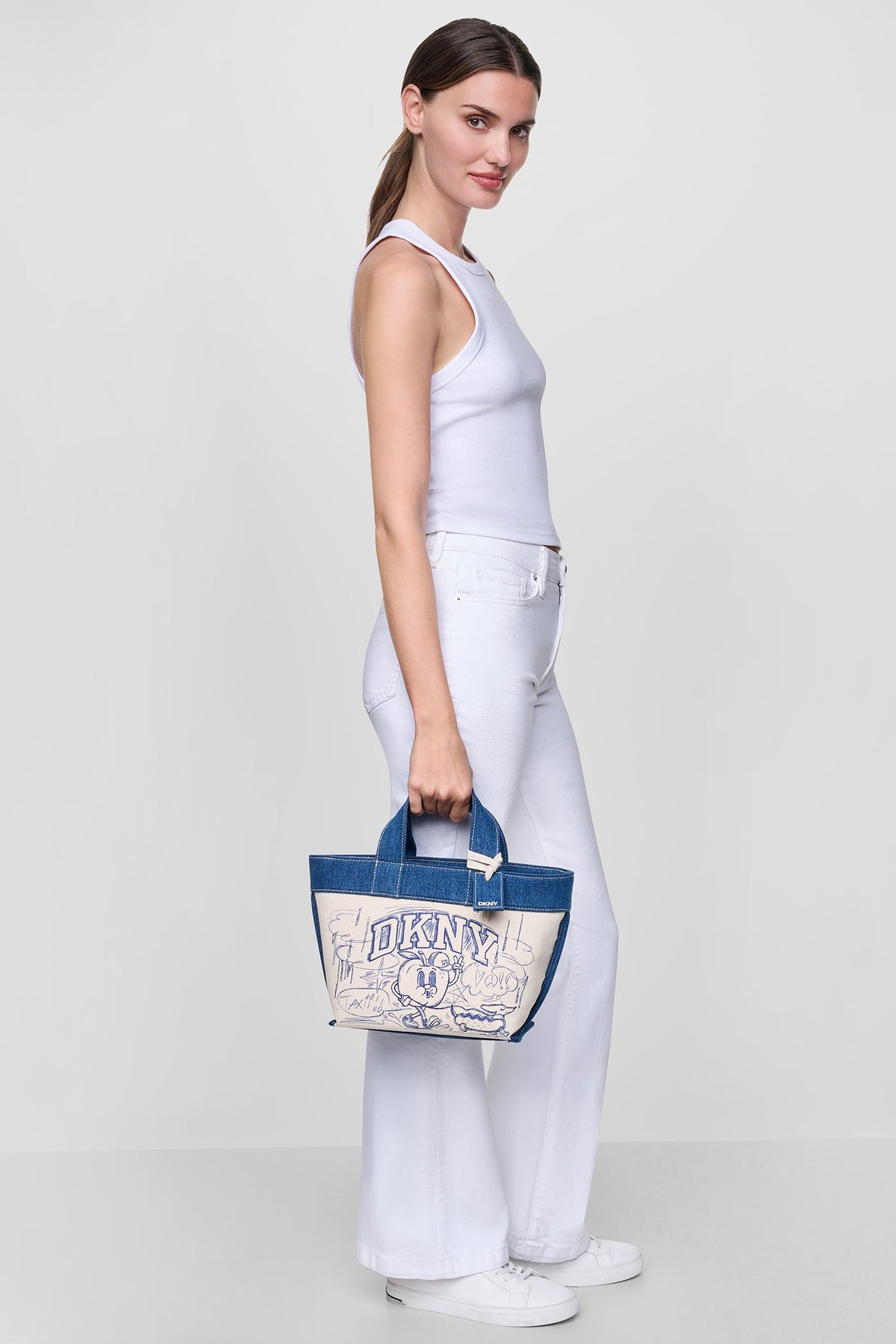 BRADY CANVAS SMALL GRAFFITI LOGO CROSSBODY BAG - Natural | DKNY